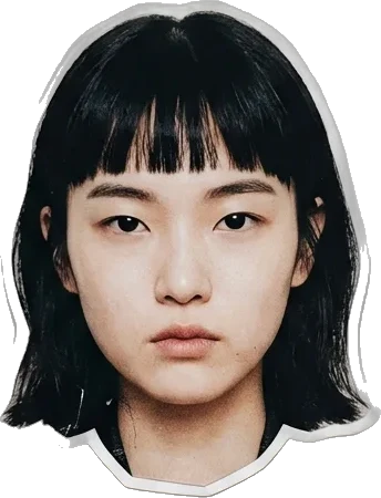 Paper cut-out of a woman with a blunt fringe